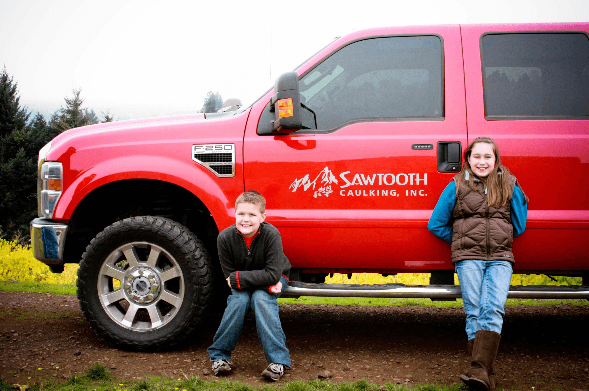 The Stoller family with the original Sawtooth truck, 2009